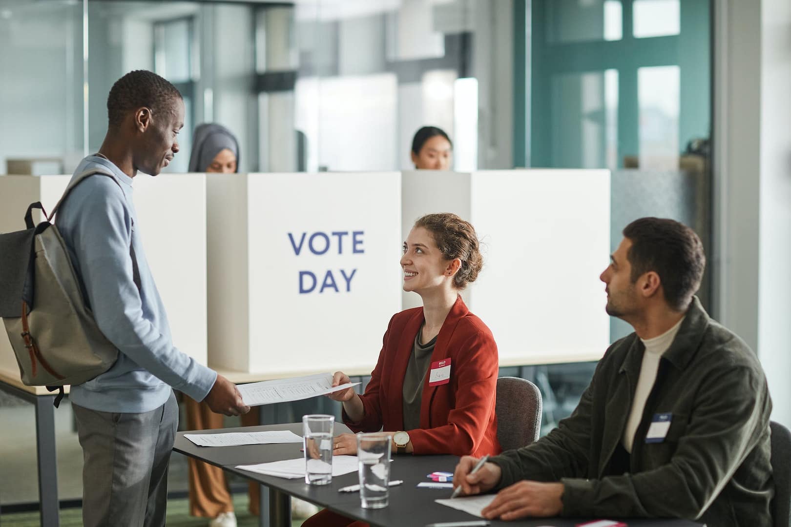 people inside a voting center